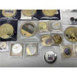 Mostly commemorative and fantasy coinage including commemorative crowns, 2018 'The Capsule Edition featuring the 2018 Paddington 50p coins' in display case, The Royal Mint Solomon Islands 2007 one ounce fine silver five dollars coin on card etc
