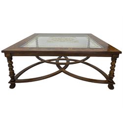 Jonathan Charles - large mahogany coffee table, the square oyster veneered top with verre églomisé inset, the glass hand-painted with gilt scrolling foliate patterns, raised on spiral turned supports with acanthus and gadroon carvings, united by interlocking demi-lune stretchers, on scrolled acanthus feet
