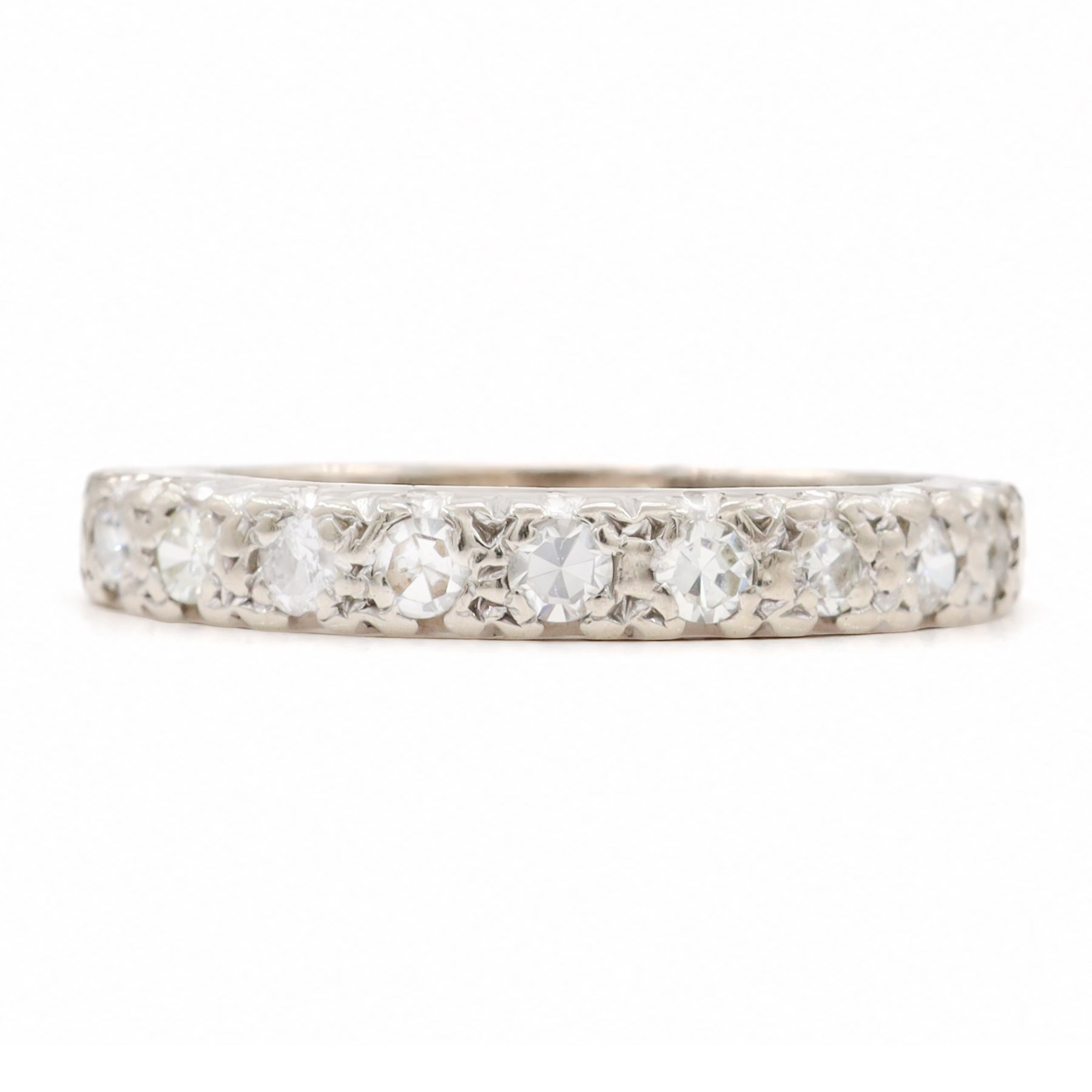 18ct white gold diamond half eternity ring, set with nine round cut diamonds, Birmingham 1965, total diamond weight approx 0.35 carat