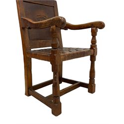 Mouseman - circa. 1930s set of six (4+2) oak dining chairs, panelled back carved with the Bagshawe family crest, the moto 'Forma Flos Fama Flatus' over an arm grasping a bugle-horn with ribbon tie and Yorkshire rose motif, adzed frame, leather lattice strap seat, on octagonal supports united by stretchers, two carvers and four side chairs, each carved with mouse signature, by Robert Thompson of Kilburn 

Provenance: Owned since manufacture by the Bagshawe family, descendants of the Staithes Group Artist Joseph Richard Bagshawe RBA (1870-1909).