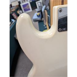 Fender jazz bass guitar, serial no. MZ7182451 made in Mexico c.2007, with cream body, white scratch plate, maple neck, guitar L120cm