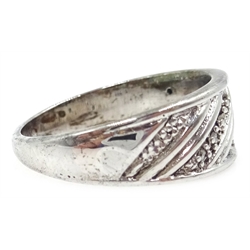  Diamond set silver band, diamond and stone set buckle ring and a stone set triangle ring, all stamped 925  