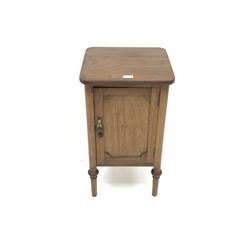 Early 20th century walnut bedside cabinet, reeded edge, single door, turned supports