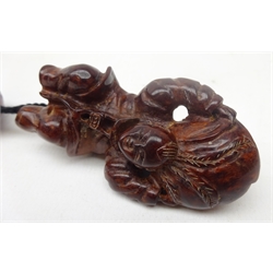  Japanese Meiji red lacquer inro carved in relief with foliage and geometric borders W8.5cm with carved burr figural Netsuke and pierced ojime bead Provenance: private collection   
