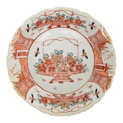 Amsterdam bont teapot, decorated with a basket of flowers, together with two Amsterdam bont saucers of similar design and five other saucers  