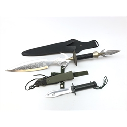  Parachute Regt. type knife 13.5cm sawback blade marked Survivor, ribbed metal handle with compass screw top, in composition scabbard with accessories and a Fantasy type knife with decorated shaped blade, handle with spear head pommel, in sheath, L67cm (2)    