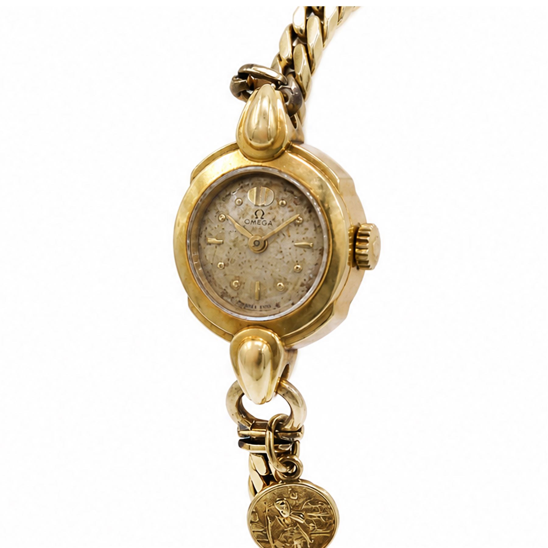 Omega ladies 18ct gold manual wind wristwatch, Cal. 212, silvered dial with dagger and dot hour markers, Birmingham 1953, on 9ct gold bracelet, with fold-over clasp, hallmarked