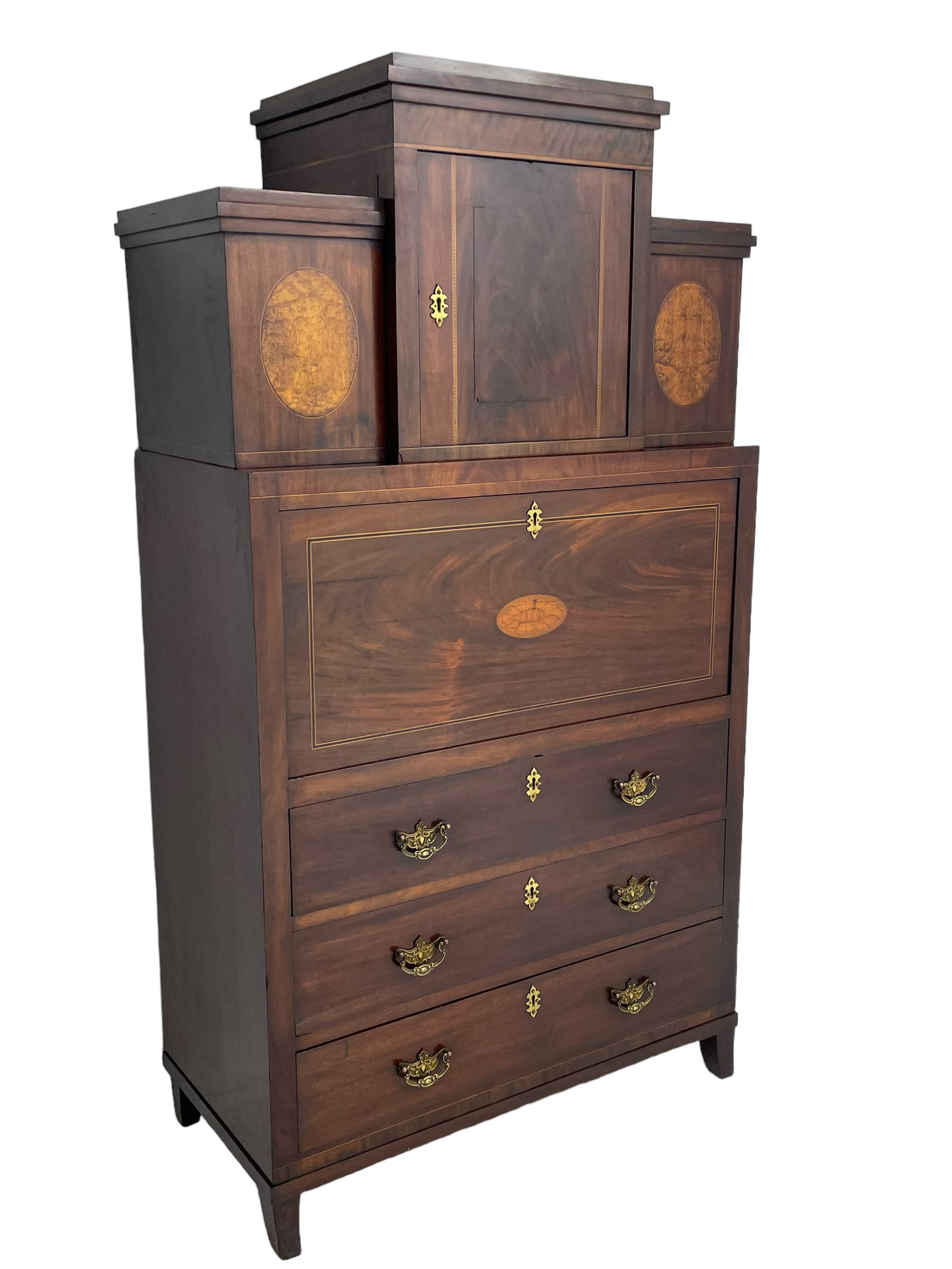 Early to mid-19th century figured mahogany Continental secrétaire à abattant, stepped top fitted with single cupboard, inlaid with oval figured amboyna panels, the fall front inlaid with shell motif enclosing a satinwood interior fitted with cupboard, drawers, and pigeon holes, three long drawers below, on square tapering feet