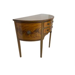 Regency design inlaid mahogany demi-lune side cabinet, reeded edge, fitted with two cock-beaded drawers flanked by two single cupboards with banded facias, raised on square tapering supports