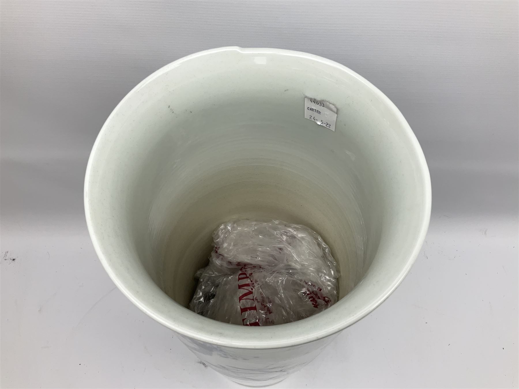 Chinese floor vase of cylindrical form decorated in blue, white and red wih birds perched upon blossoming branches, with flared rim, H62cm