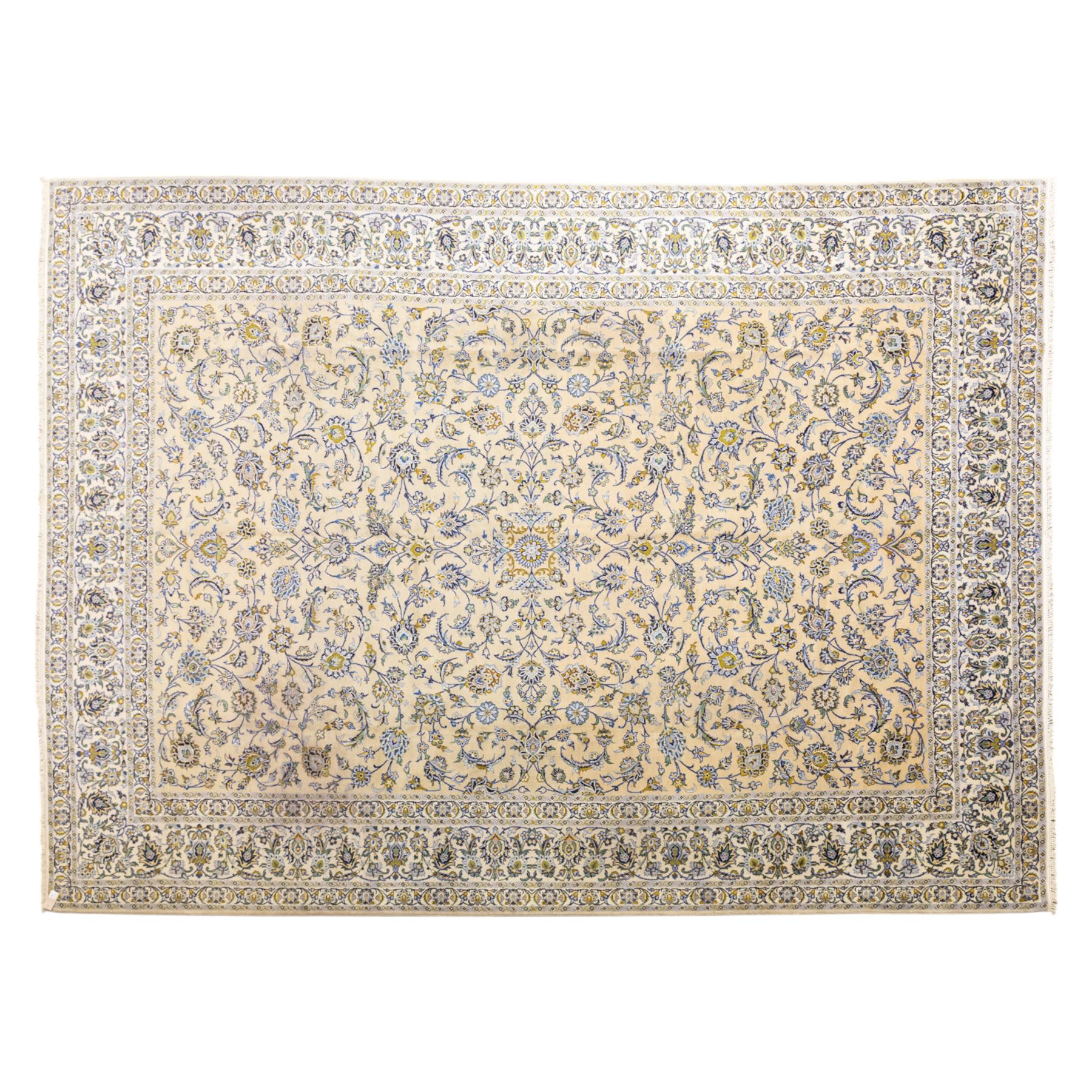 Central Persian Kashan hand-knotted carpet, pale ivory ground, decorated with an all-over scrolling floral design of palmettes rosettes, and leafy vine work enclosed by a wide floral border and multiple guard borders in tones of soft blues, sage green, muted gold, and ivory, with cotton fringe ends