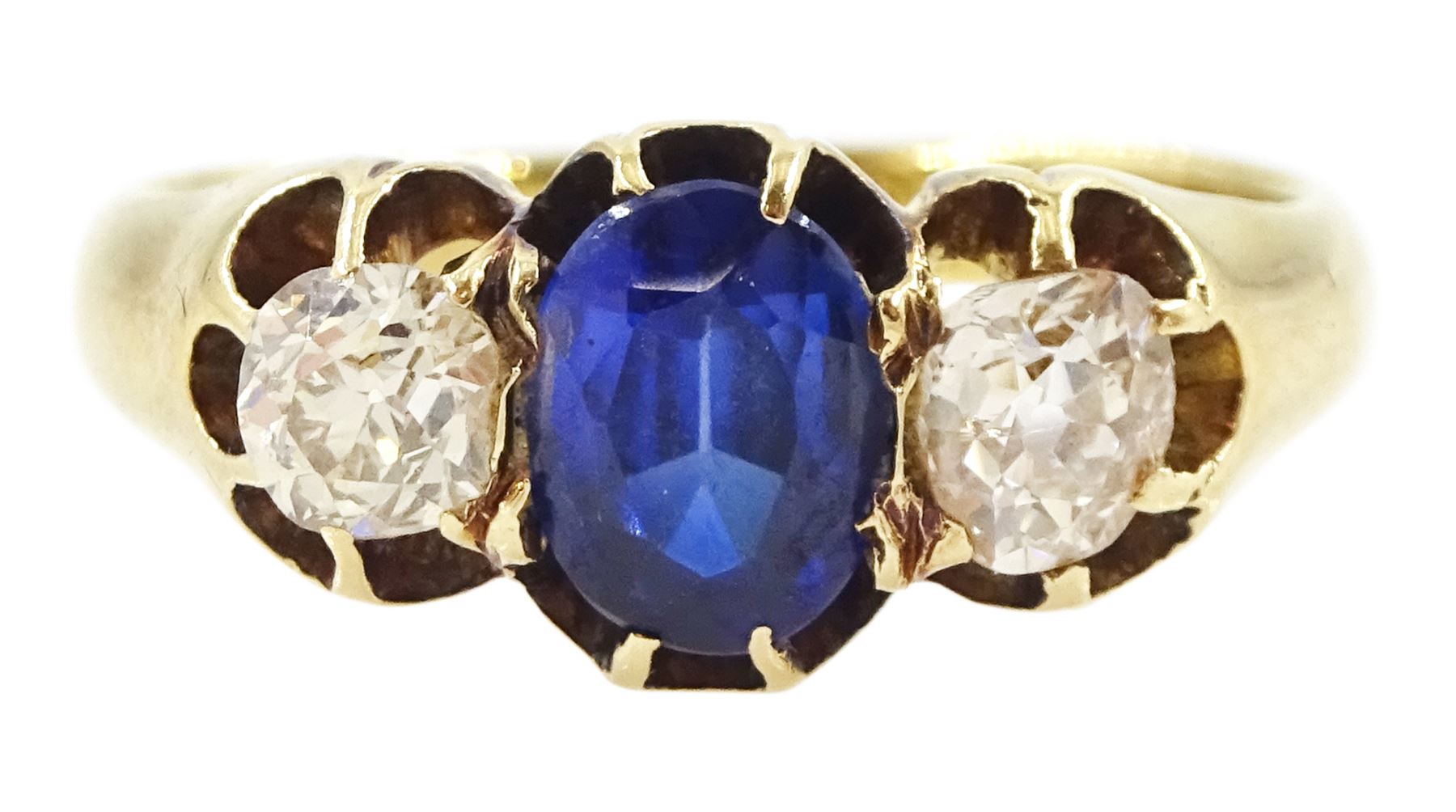 Victorian 18ct gold three stone oval cut sapphire and old cut diamond ring, Birmingham 1895, sapphire approx 0.90 carat, total diamond weight approx 0.55 carat