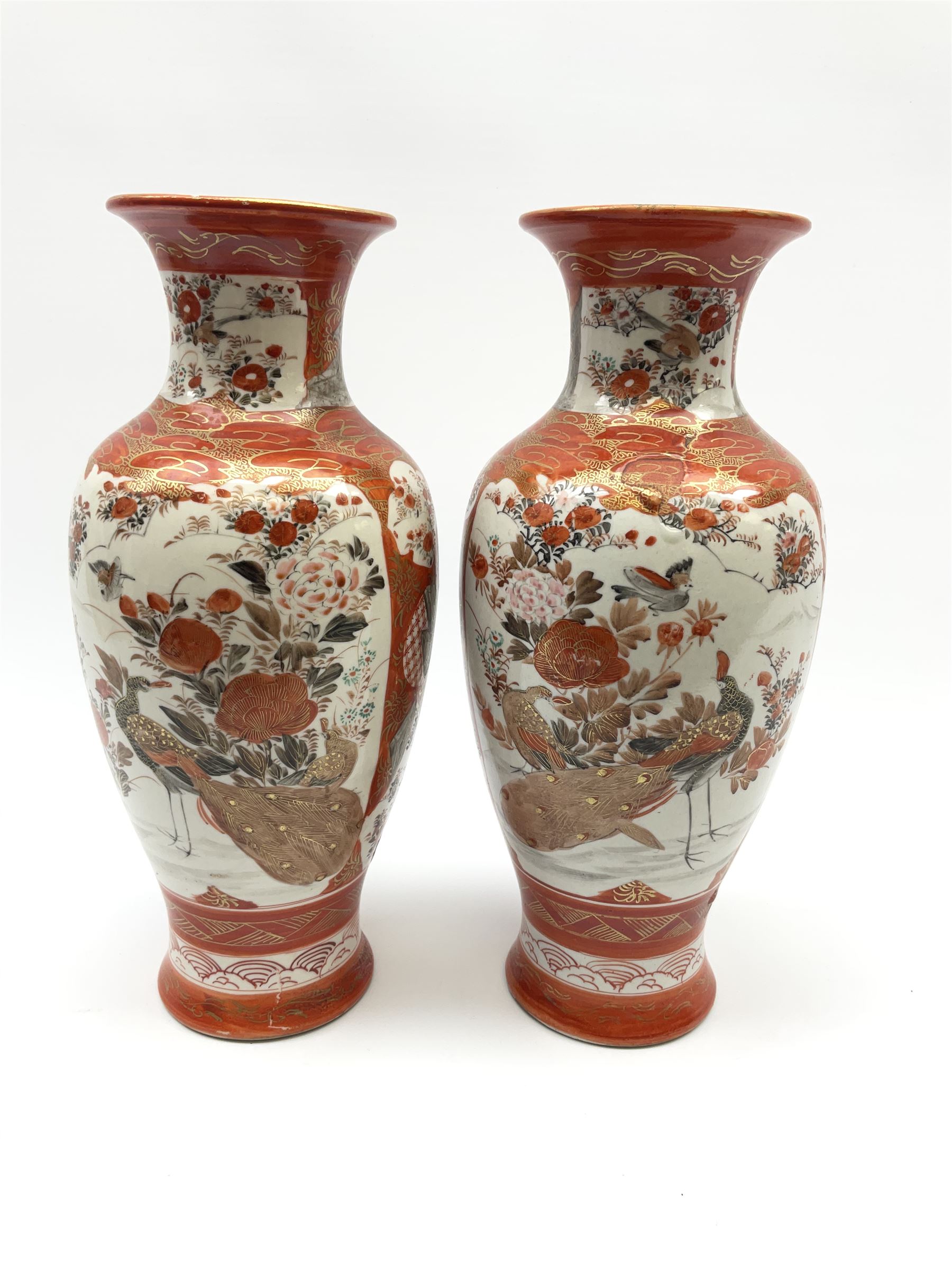 A pair of Japanese Kutani vases, of baluster form decorated with panels of birds and flowers, each with marks beneath, H30cm. 
