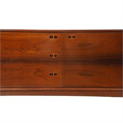 Robert Heritage (1927-2008) for Archie Shine - Large rosewood sideboard, with a central bank of three drawers flanked by a cupboard either side, raised on square tapering supports