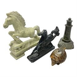 Cornish carved serpentine model of a lighthouse, together with a Chinese soapstone figure of a horse, another carved horse figure and a carved hardstone armadillo