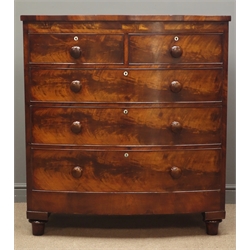  Victorian mahogany bow front chest of two short and three long drawers with turned wooden handles and feet, W107cm, H116cm, D54cm  