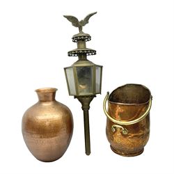 20th century brass carriage lantern, with six glass panels and eagle finial, together with a copper coal scuttle and hammered copper vase, lantern H77cm
