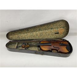 Czechoslovakian violin c1920 with 36cm two-piece maple back and ribs and spruce top, bears label 'Copy of Antonius Stradivarius Made in Czechoslovakia' L59cm; in carrying case; 1950s Czechoslovakian violin; and 195os Czechoslovakian three-quarter size violin; both cased (3)