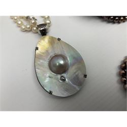 Collection of coloured pearl jewellery including earrings, necklaces, bracelets and pendants 