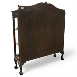 Early 20th century mahogany display cabinet, shaped pediment over a dentil moulded cornice, twin astragal glazed doors enclosing three shelves, raised on cabriole supports with pad feet
