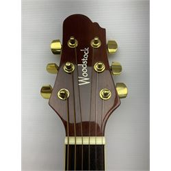 Woodstock model no.WHW41J203 acoustic guitar with mahogany back and sides and spruce top, serial no.2835 L102.5cm; in soft carrying case