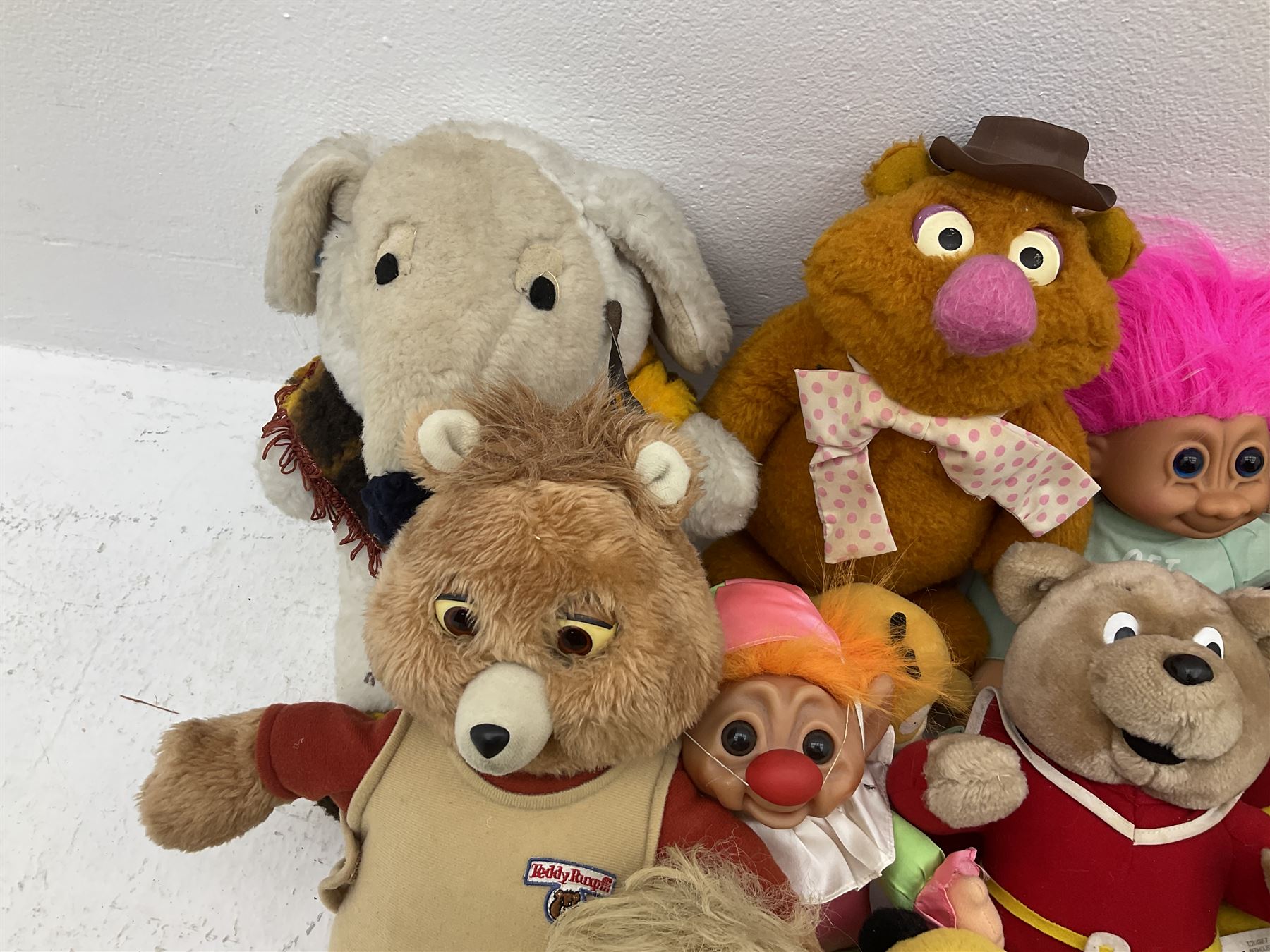 Quantity of stuffed toys and dolls to include Teddy Ruxpin, Cabbage Patch, Troll doll, and a quantity of plastic toys including Sylvanian Families Country School etc, in two boxes
