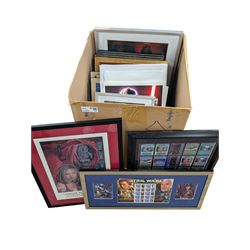 Collection of art prints, including Star Wars and Buffy the Vampire Slayer, some with spur...