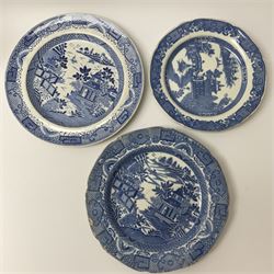 A group of 19th century blue and white transfer printed pottery, various makers and patterns, to include Minton Queen of Sheba pattern plate, Joshua Heath Reindeer pattern plate with towering pagoda, and seal in the foreground, a number of plates decorated in the Chinoiserie Bridgeless pattern, two Mandarin type pattern plates, possibly Spode, etc. 