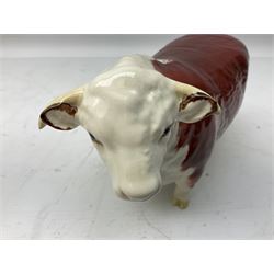 Three Beswick models comprising Hereford Bull no 949, 'CH Cutmil Cupie' Pug, and bay Shire horse, all with printed marks beneath