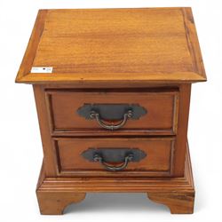 Singapore hardwood bedside chest, rectangular moulded top above two drawers fitted with metal plate handles, on shaped bracket feet