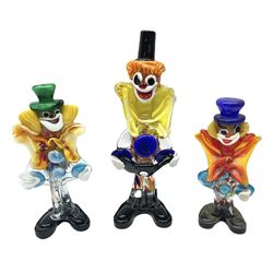 Three Murano style glass clowns, tallest 31cm