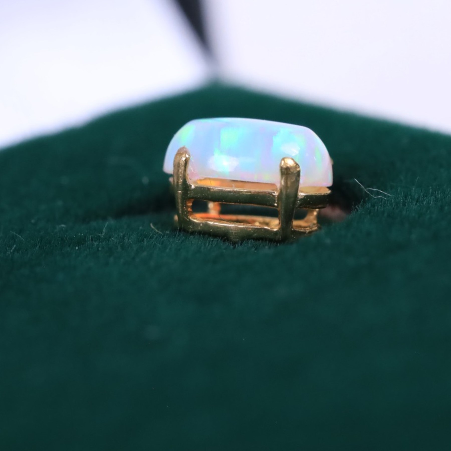 Pair of 9ct gold oval opal stud earrings, boxed