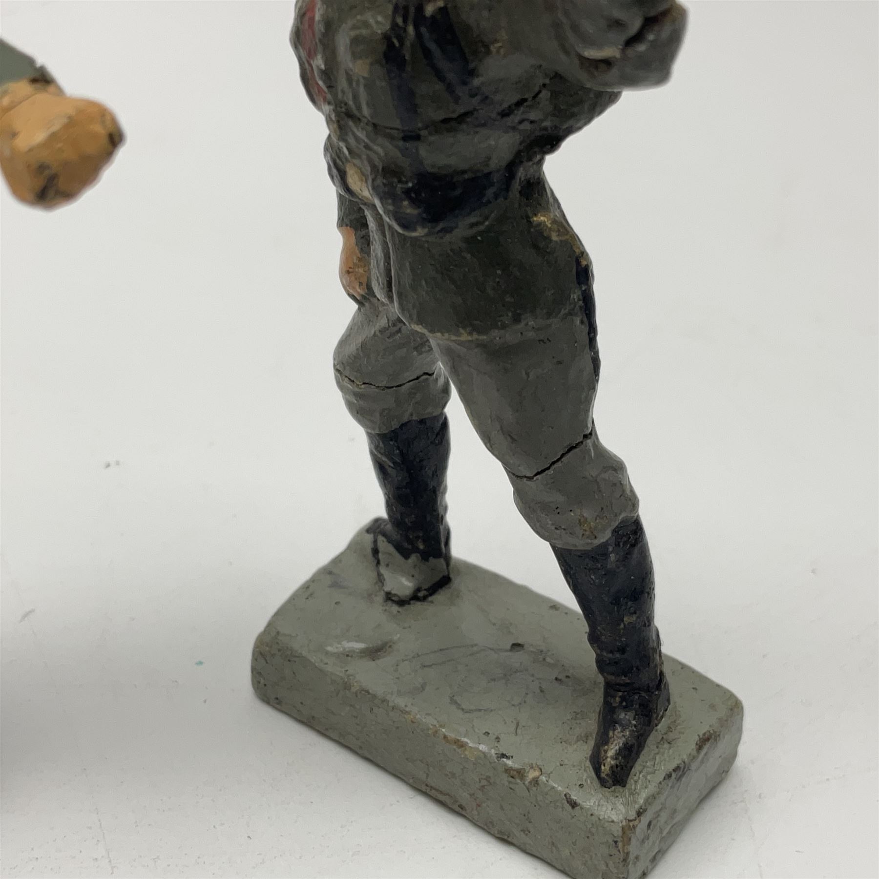 German Lineol Flak Artillery Gun on revolving base H11cm; four other Lineol WW2 German soldiers; and three Elastolin German soldiers including reclining radio operator (8)