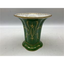Dresden vase of tapering form, painted with a central reserve of blooming flowers surrounded by gilt border and green ground decorated with gilt leafy scrolls, upon splaying foot, with mark beneath, H18.5cm