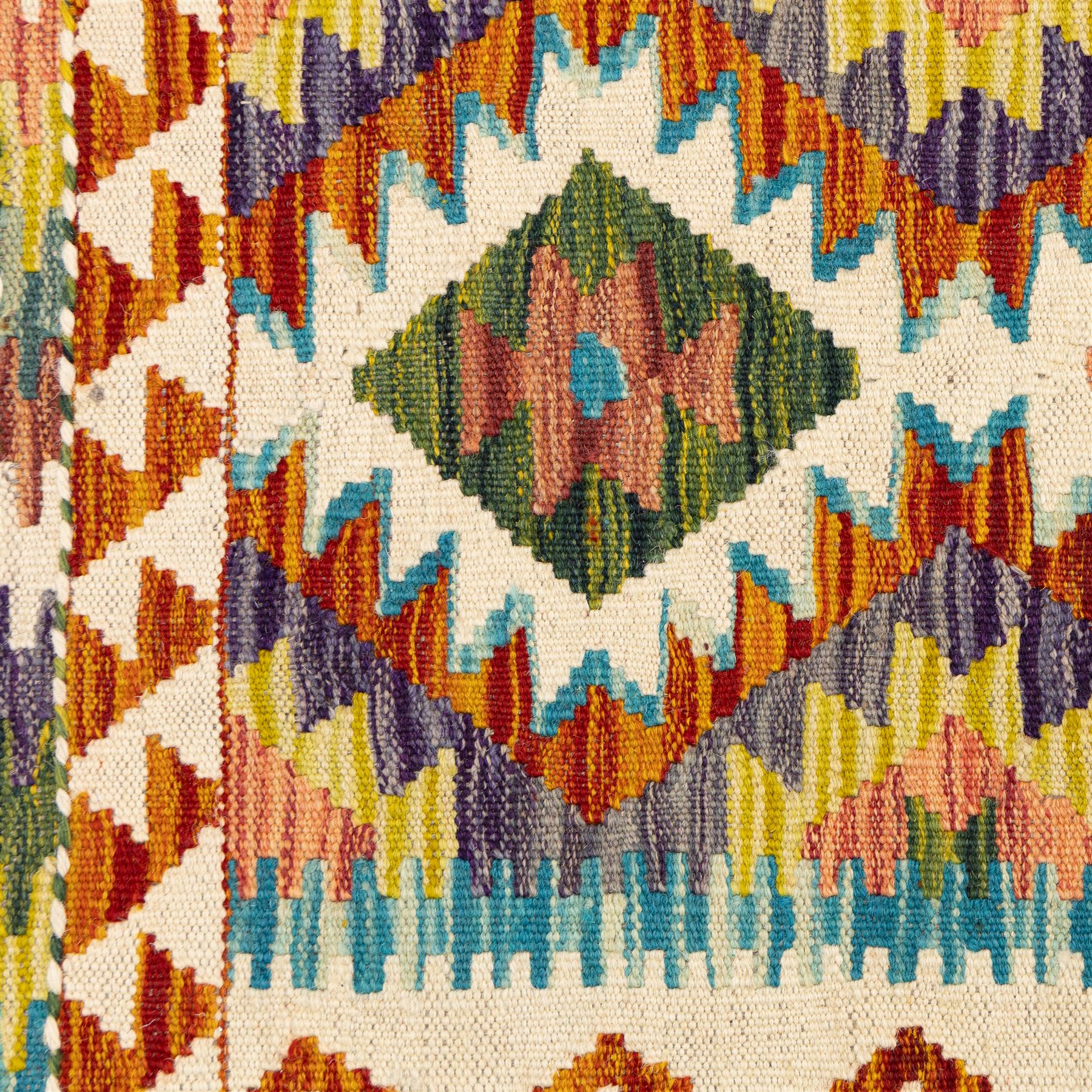 Two Chobi flatweave kilim runners with a repeating stepped diamond medallion design in live green, rust, teal, purple, and ivory, framed by chevron and geometric borders, (2)