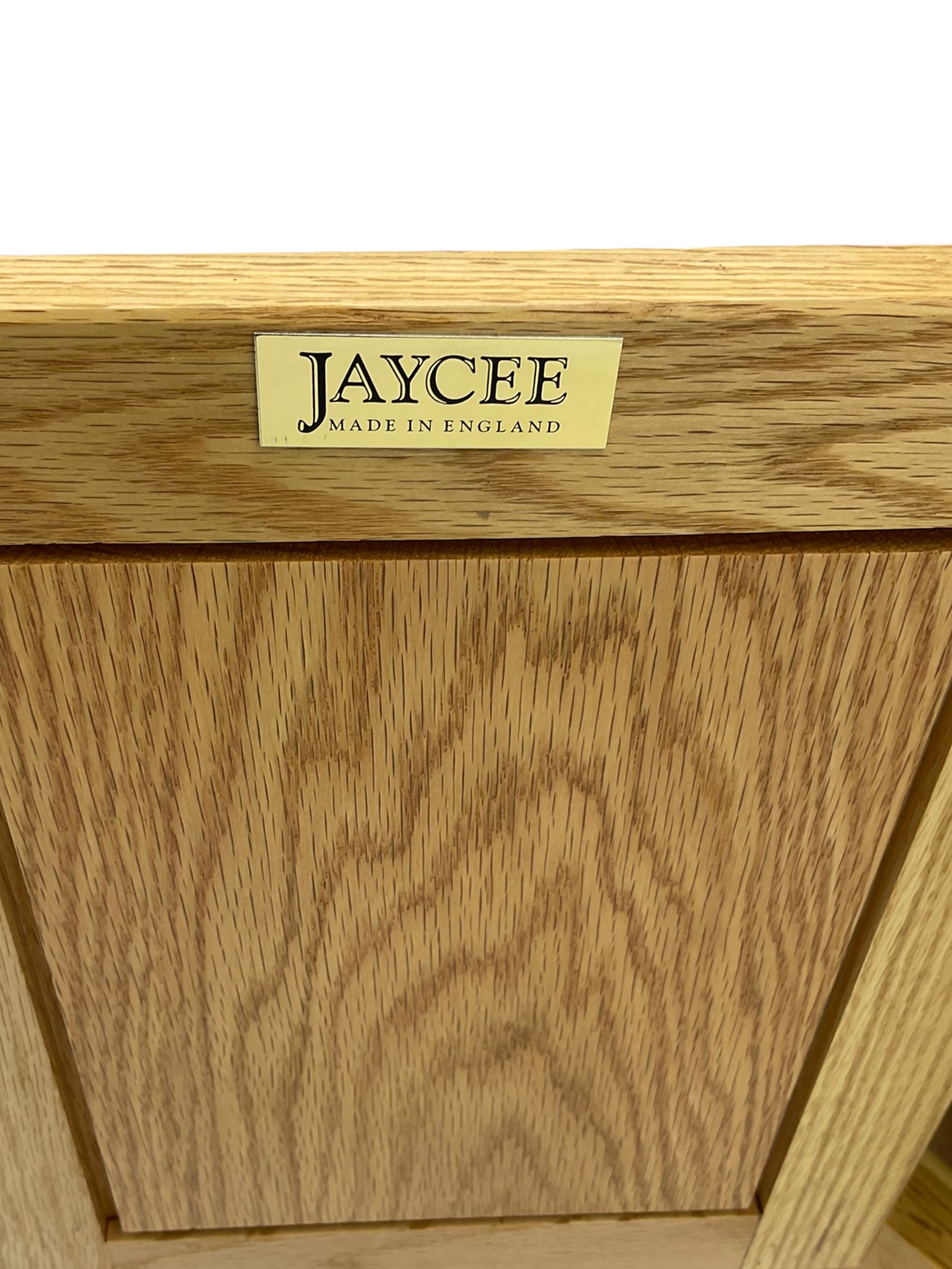 Light oak telephone table, with cupboard, upholstered seat