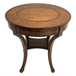 19th century Italian Kingwood oval side table, the top inlaid with a classical religious festival scene with the goddess and her handmaidens in a cart pulled by putti, within ribbon tied foliage border with cameo portraits, single frieze drawer, on four saber supports joined by shaped undertier, with gilt carved paw feet