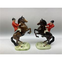 Beswick Hunting Group, comprising huntsman on bay horse, model no.1501, two huntsmen on bay horses, model no.868, together with standing fox, model no.1440 and two fox hounds, all with printed marks beneath