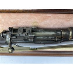 WW2 Lee Enfield No.4 Mk.1 .303 bolt-action rifle with hinged butt compartment, made by SA Ltd., Long Branch, Canada 1942, serial no.5L0646 L113cm; mounted on a framed display board with No.4 Mk.II spike bayonet, No.9 Mk.1 blade bayonet, two inert 5-round clips and brass biographical plaque by Antler Military Originals detailing DA Cert No.C3444 OLD STYLE DEACTIVATION SO FIREARMS CERTIFICATE REQUIRED OR RFD