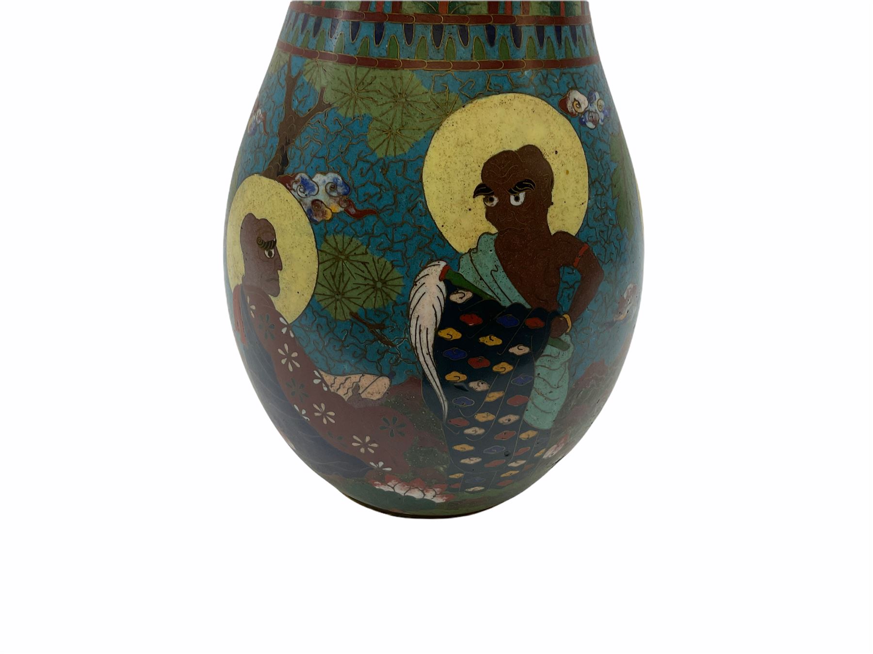Japanese Cloisonne vase, Meiji/Taisho period, decorated with five haloed figures, possibly the Lucky Gods or Monks, in a landscape detailed with pine trees, lotus flowers and auspicious clouds, beneath a neck with band of fronds, with apocryphal Ming mark beneath, H31cm