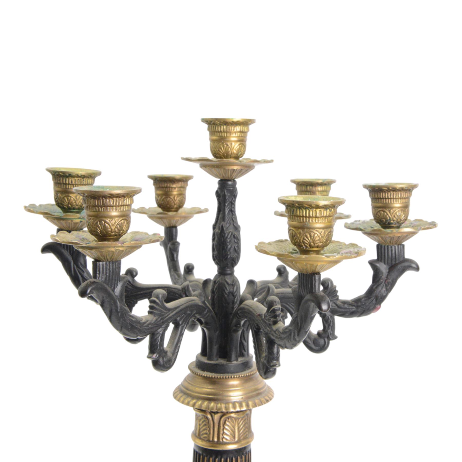 Pair of 20th century Corinthian column seven branch candelabra, with gilt brass sconces and swept acanthus leaf pedestal bases, H69cm (2)