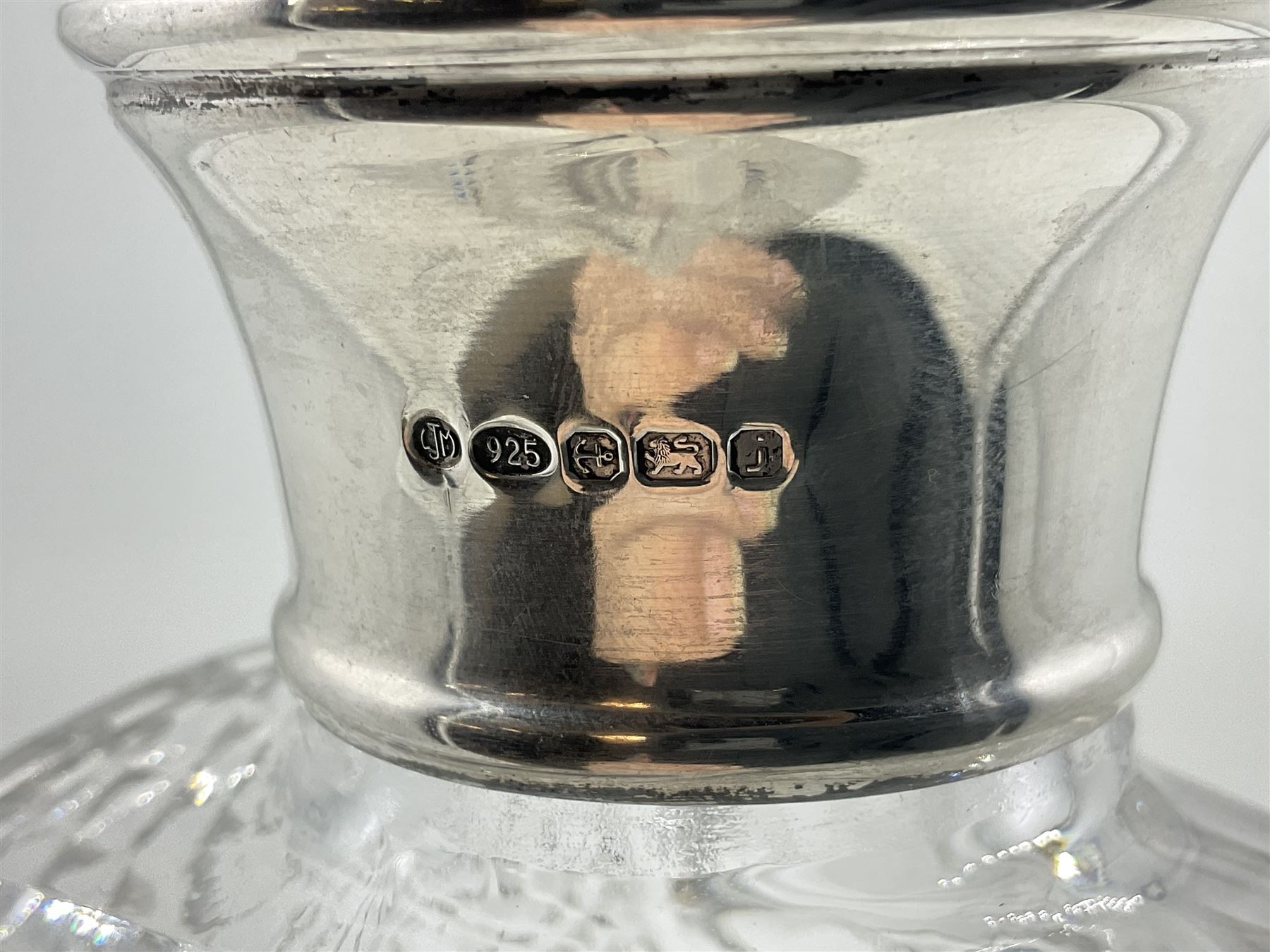 Modern silver mounted glass decanter, the cut glass body of circular form, with personal engraving, the silver collar hallmarked L J Millington, Birmingham 2008, overall H23.5cm