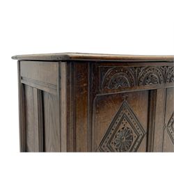 18th century oak coffer or chest, rectangular triple panelled hinged top with moulded edge enclosing main compartment and candle box, the frieze carved with repeating concentric lunettes and foliate patterns, the front fielded panels decorated with lozenges containing central flower heads, on stile supports