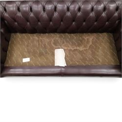 Thomas Lloyd - traditional shape Chesterfield two seater settee with rolled back and arms, upholstered in buttoned deep oxblood leather with loose seat cushions, raised on turned feet