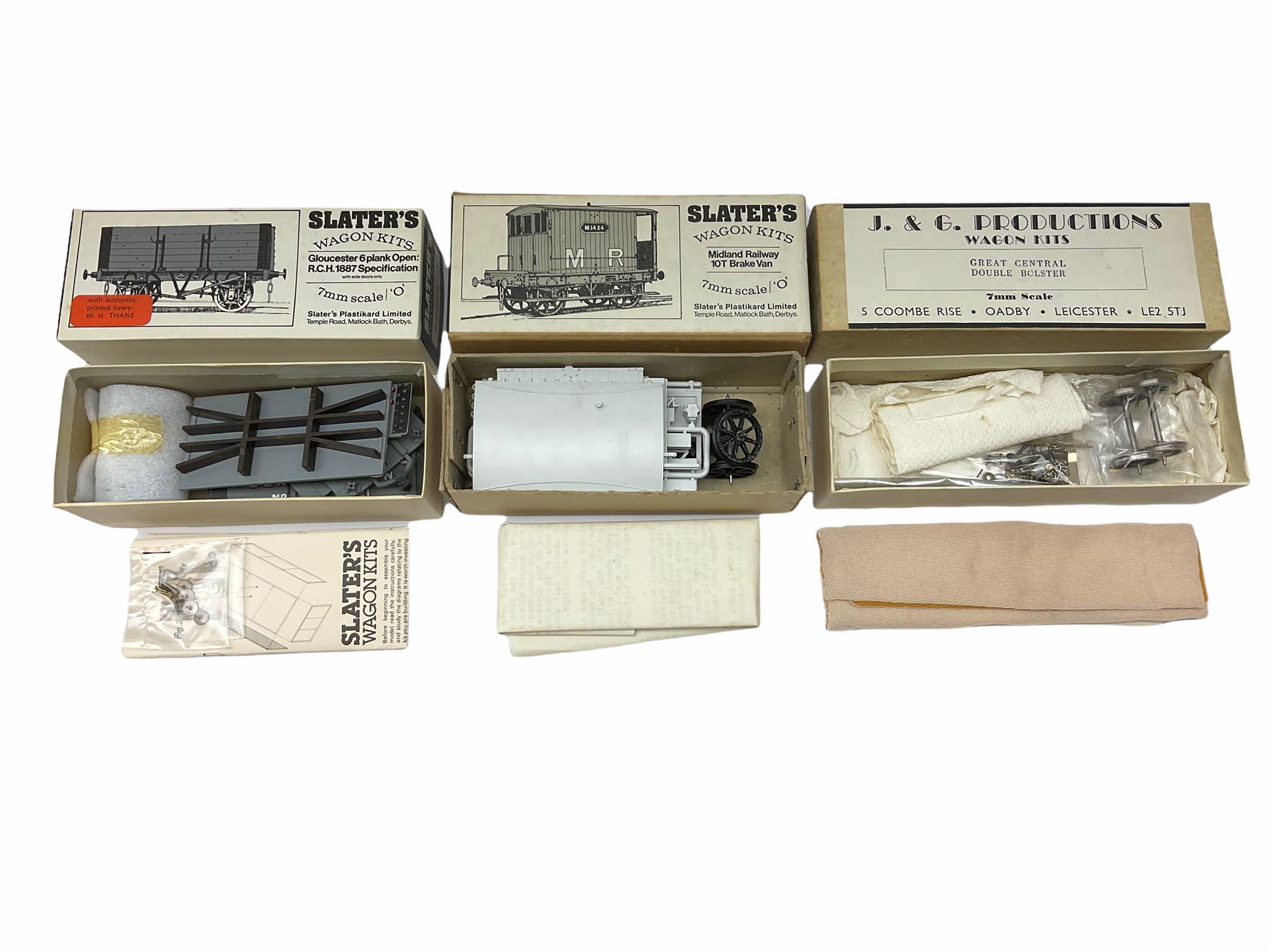 '0' gauge - Twelve unmade railway wagon kits by Slaters, J. & G. Productions, C. & U. Castings and CCW Productions including brake vans, cattle trucks, fruit van, tank wagons, open wagons etc; predominantly plastic but some die-cast; all but one boxed (12)