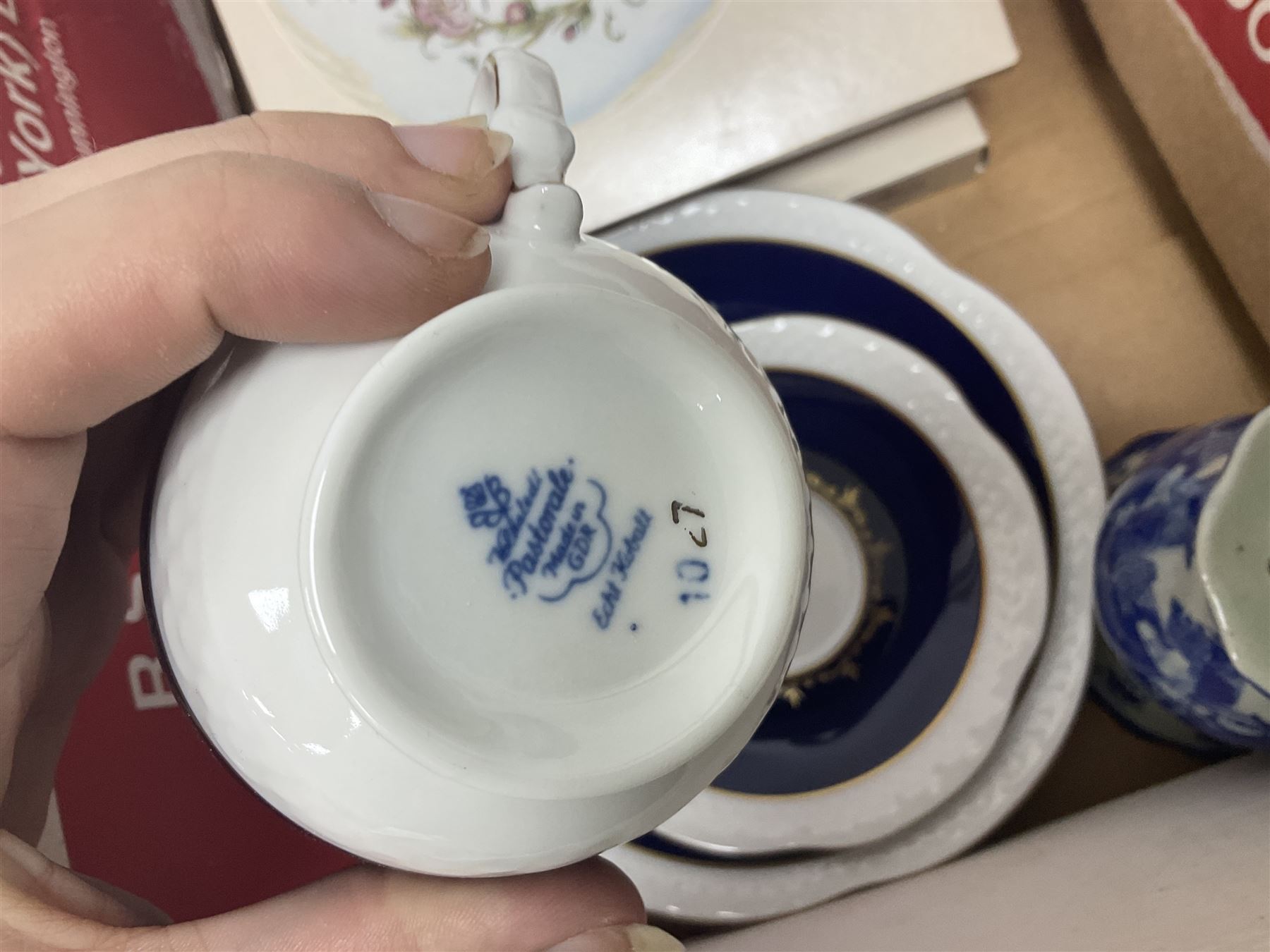 Echt Kobalt tea wares, comprising of tea cup, saucer and dessert plate, together with two Hutschenreuther plates of the month, another similar plate and a Ironstone hatpin holder, 'Gateway to the Moors North Yorkshire' oval oil on board signed by Valerie Barnaby, framed needlework, Leonardo Collection figure group, dressing table set, lamps etc in two boxes