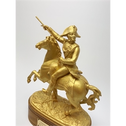 Gilt painted spelter figure of Napoleon Bonaparte on rearing horse, mounted on a later fruitwood base with titled plaque H35cm