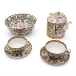 19th/ early 20th century Chinese Canton famille rose porcelain teapot with swing handle, pair of teacups and saucers, and later bowl (6)