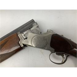 Winchester Japan 5500 12-bore by two-and-three quarters over-and-under double barrel boxlock ejector sporting gun, with 71cm barrels, ventilated rib and barrels, the walnut stock with chequered pistol grip and fore-end, single selective trigger and top safety, serial no.K542927E, L115cm overall; in gun sling SHOTGUN CERTIFICATE REQUIRED