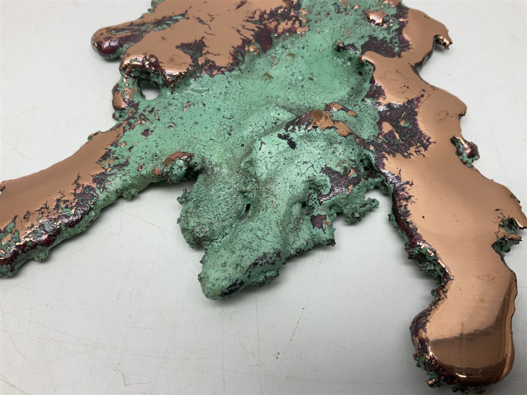 Large free form copper splash, with green patina and polished copper accents, at largest point H16cm, L18cm